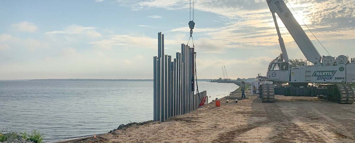 crane laying beams for SH 334 construction