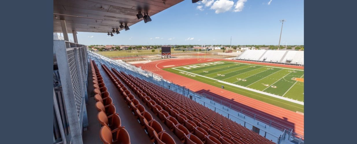 view from bleachers of field at Hutto ISD Memorial Stadium in Hutto, TX